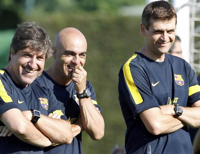 Tito Vilanova (d), el recuperador físico, Juanjo Brau (c), y el segundo entrenador, Jordi Roure. Foto: EFE