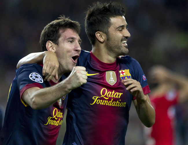 El argentino del FC Barcelona Lionel Messi celebra con David Villa. Foto: EFE