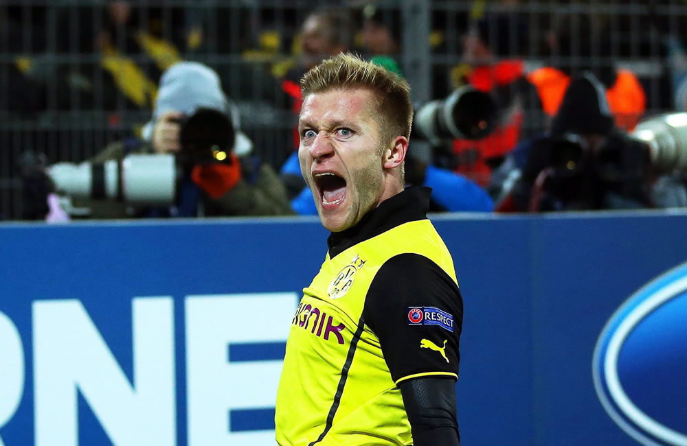 El jugador del Dortmund Jakub Blaszczykowski celebra después de anotar un gol ante Nápoles. Foto: EFE