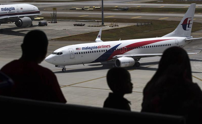 Familia de viajeros de avión de Malaysia Airlines desaparecido. Foto: EFE
