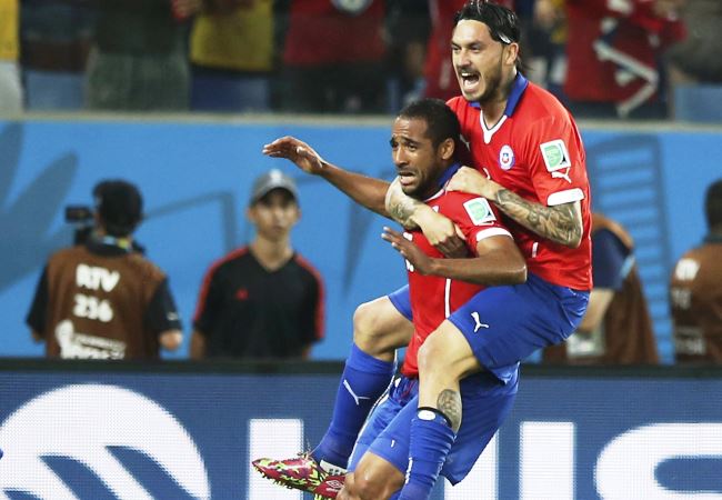 Chile comenzó con pie derecho su camino en la Copa del Mundo de Brasil. Foto: EFE
