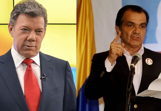 El candidato-presidente de Colombia Juan Manuel Santos y el candidato Óscar Iván Zuluaga. Foto: EFE