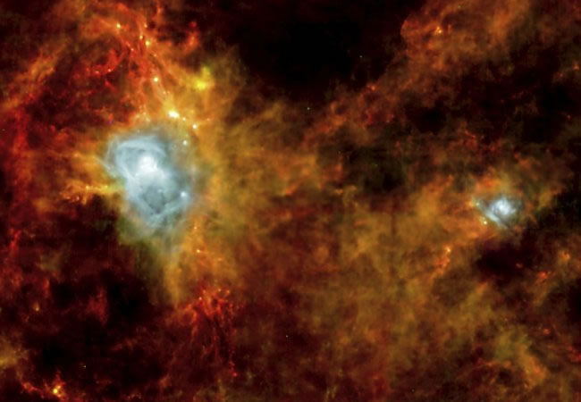 Nube de polvo espacial situada a mil años luz que eventualmente se convertirá en unas cien estrellas.(ESA). Foto: EFE