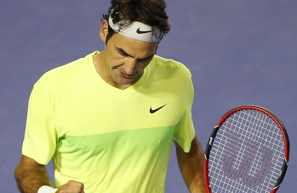 El tenista suizo Roger Federer celebra la victoria ante Yen-Hsun Lu. Foto: EFE