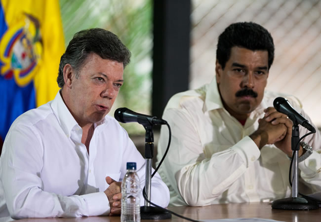 El presidente, Juan Manuel Santos y el presidente Nicolás Maduro. Foto: EFE