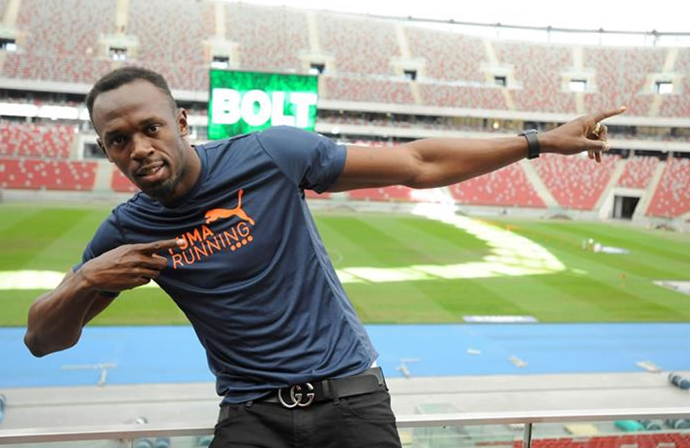 El jamaicano Usain Bolt (dcha), plusmarquista mundial y campeón olímpico Usain Bolt. Foto: EFE