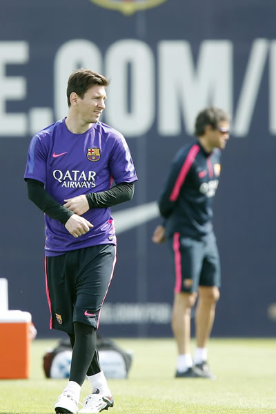 El jugador del FC Barcelona Leo Messi (i), y el técnico del club, Luis Enrique Martínez. Foto: EFE