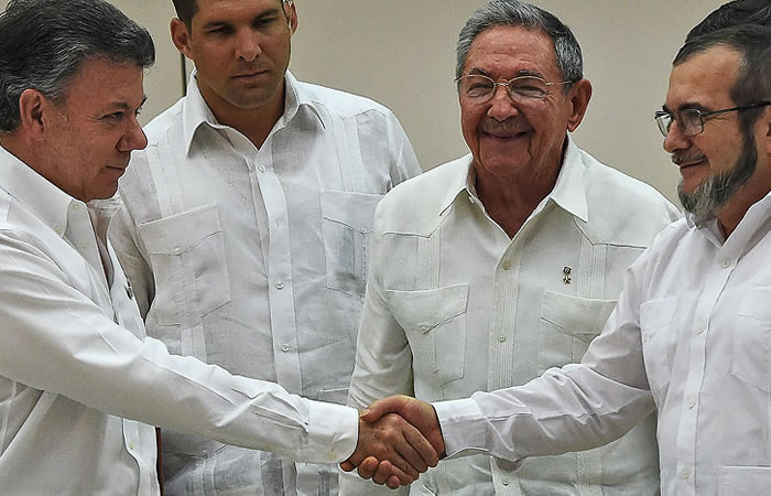 Presidente Juan Manuel Santos y Jefe de las Farc, Timoleón Jiménez alias "Timochenko". Foto: EFE