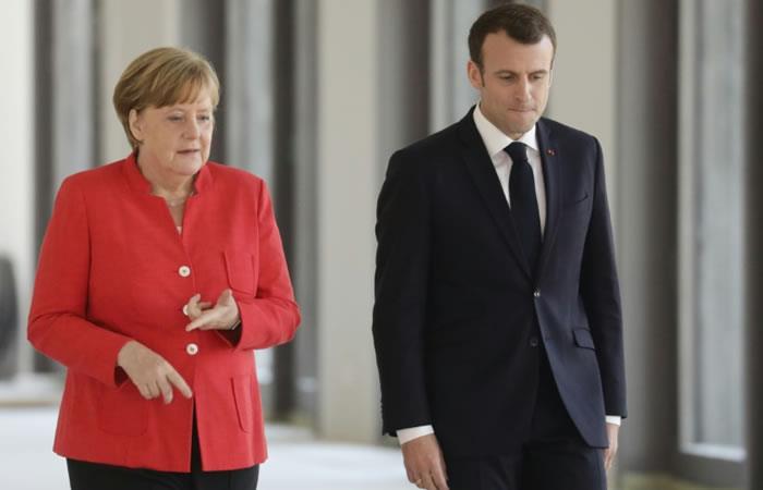 La canciller alemana Angela Merkel y el presidente francés Emmanuel Macron en Berlin. Foto: AFP