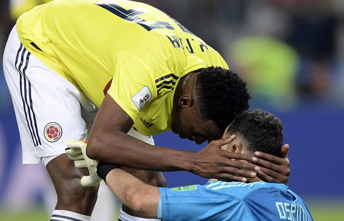 Yerry Mina y David Ospina tras la eliminación de la selección Colombia en el Mundial de Rusia. Foto: AFP