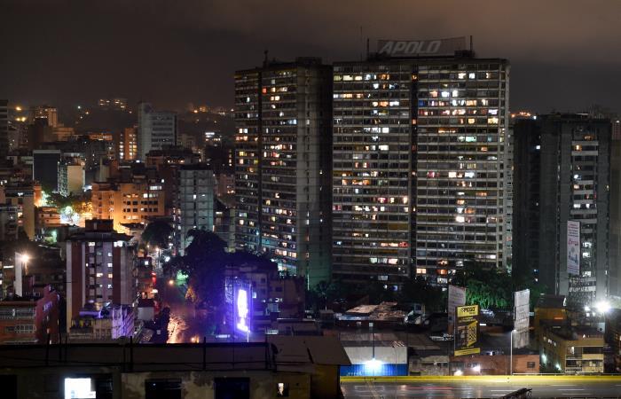 La viviendas en Caracas abandonadas y éxodo de migrantes se eleva en la región. Foto: AFP