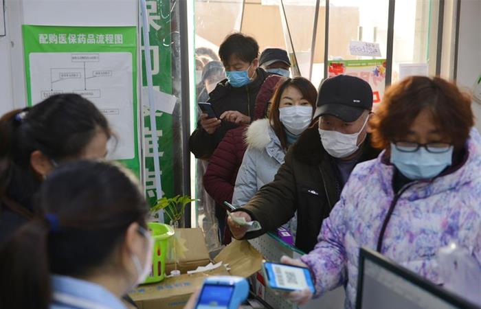 El uso de la mascarilla es obligatorio en China. Foto: EFE