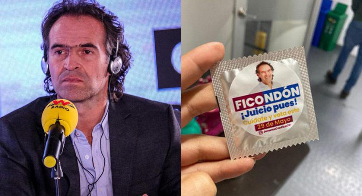 Federico Gutiérrez entrega a los jóvenes un preservativo al que llama 'Ficondón'. Foto: Twitter @WRadioColombia / @Lyn_Mancipe