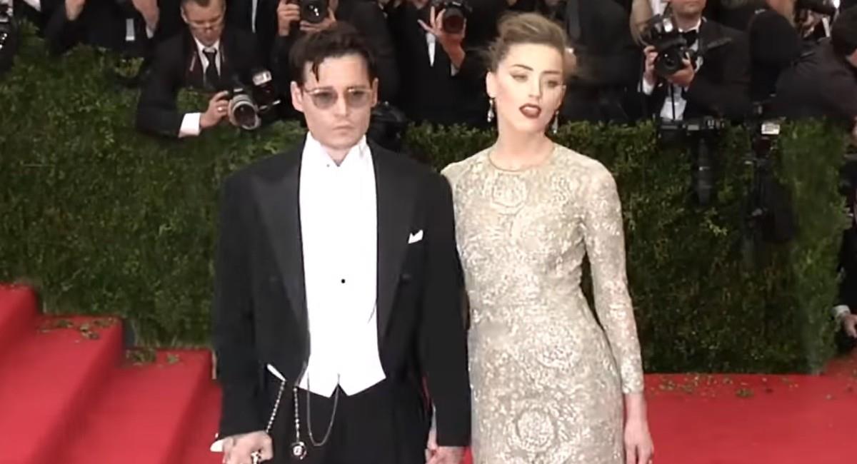 Amber Heard y Johnny Depp en alfombra roja. Foto: Youtube