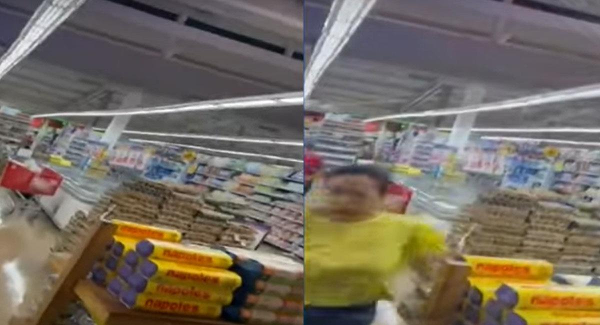 Un video captó cómo clientes y trabajadores de un supermercado se refugiaban de las balas en un asalto. Foto: Youtube