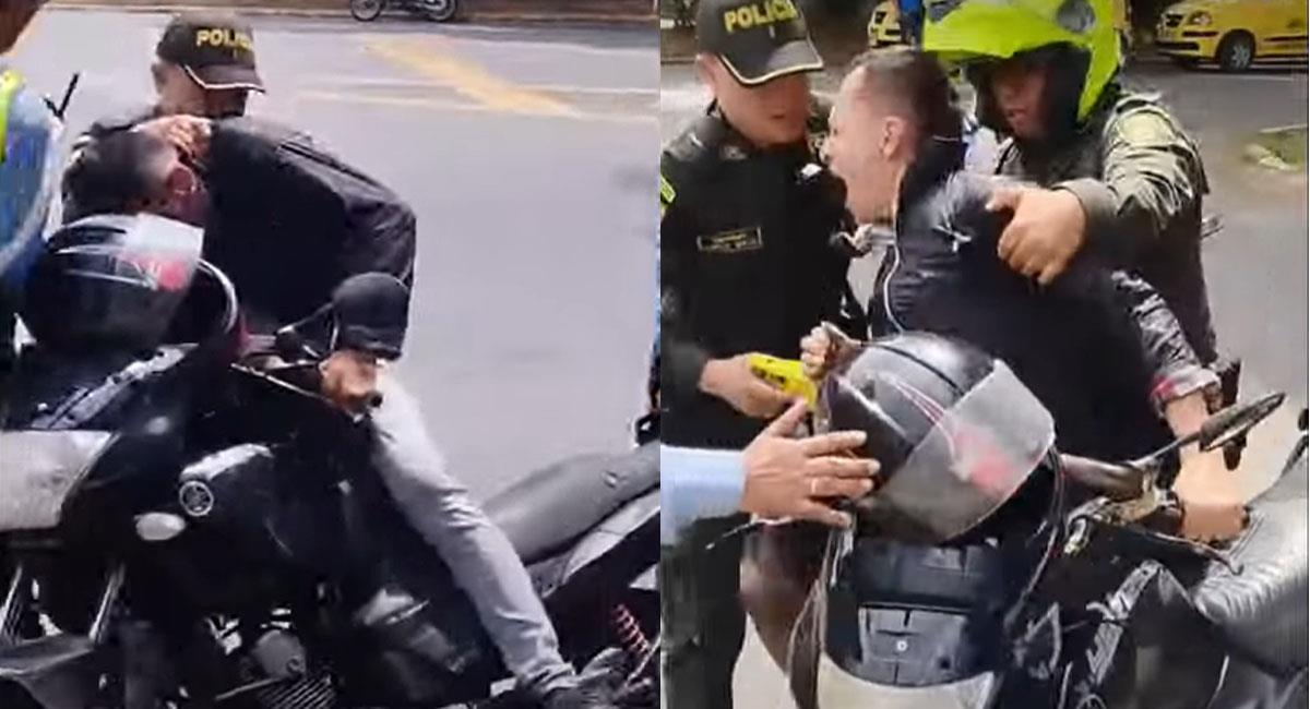 Policías de Bucaramanga tratan de arrestar a un motociclista usando un taser. Foto: Youtube