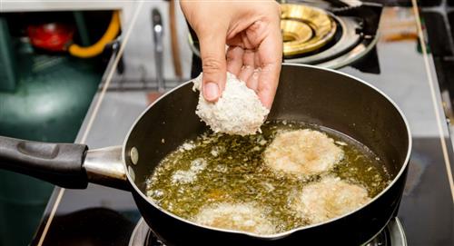¿Cómo evitar que el aceite salpique al freír alimentos?